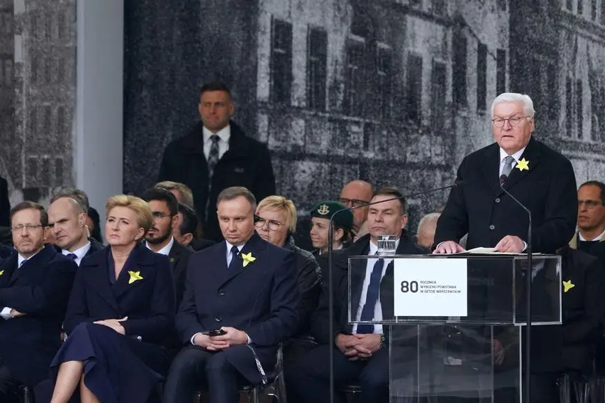German President Frank-Walter Steinmeier (R) delivers a speech as Israel\\'s President Isaac Herzog (L), Polish President Andrzej Duda (2nd R) and his wife Agata Kornhauser-Duda (2ndL) listen during the central commemoration ceremony of the 80th anniversary of the start of the Warsaw Jewish Ghetto Uprising, in Warsaw, Poland on April 19, 2023. - Poland will mark 80 years since the Warsaw Ghetto Uprising, when hundreds of Jews launched a doomed attack against the Nazis, with the commemorations looking beyond the fighters and emphasising the civilian experience. The presidents of Germany and Israel will join their Polish counterpart for the anniversary of the month-long revolt, which was the largest single act of Jewish resistance against the Germans during World War II. (Photo by JANEK SKARZYNSKI / AFP) , Agence France-Presse (AFP)