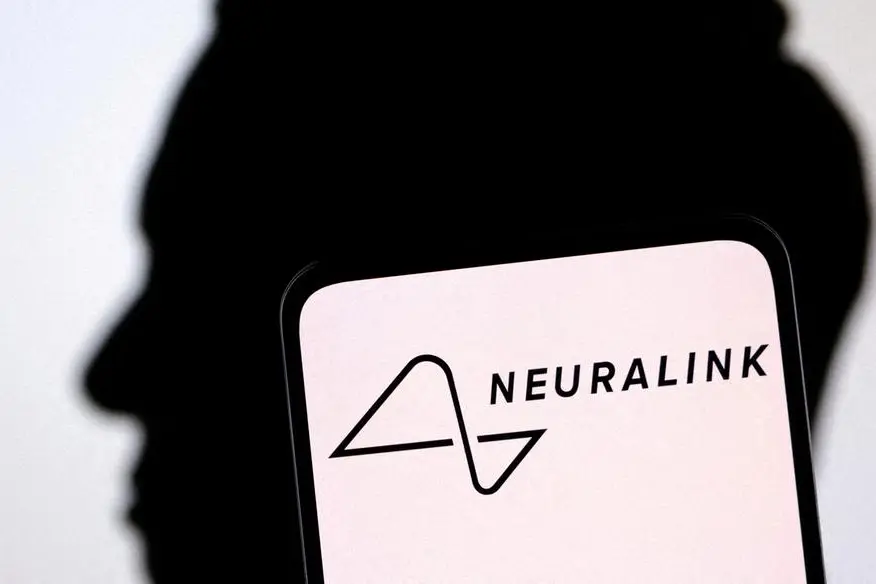 FILE PHOTO: Neuralink logo and Elon Musk silhouette are seen in this illustration taken, December 19, 2022. REUTERS/Dado Ruvic/Illustration/File Photo , Reuters