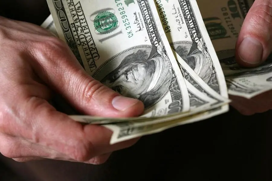 New World bondholders receive interest payment on dollar note, Bloomberg News reports
