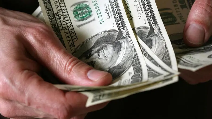 Dollar set for weekly gain as firm US data tempers Fed easing bets