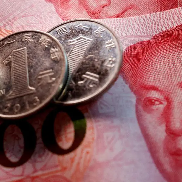 China's yuan on track for best month in a year as dollar recoils