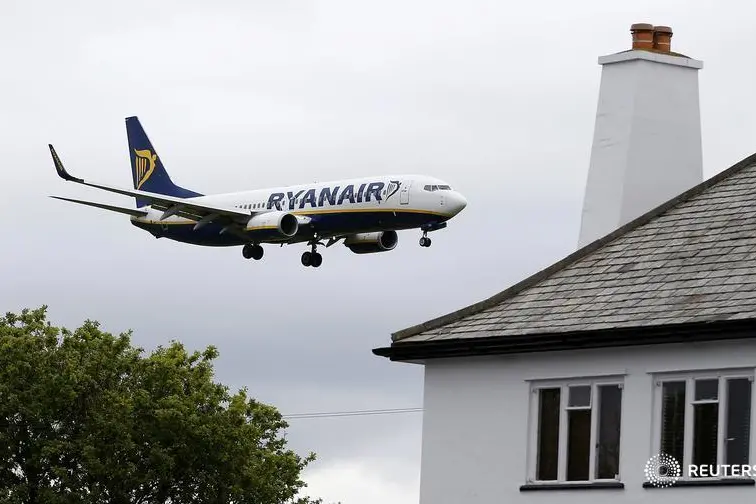 A Ryanair aircraft lands at Manchester Airport in Manchester, north-west England, Britain, May 26, 2015. Ryanair trumpeted the success of its image makeover after soaring passenger numbers helped the Irish airline to post a 66 percent rise in full-year profit. The budget carrier, whose outspoken CEO Michael O\\'Leary softened his notoriously no-frills business model last year, said passenger numbers grew nearly three times faster than original estimates thanks to a combination of improved service and lower fares. REUTERS/Andrew Yates - RTX1ELGF