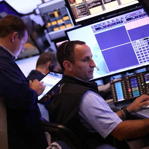 Stock markets mostly higher before key earnings, rate calls