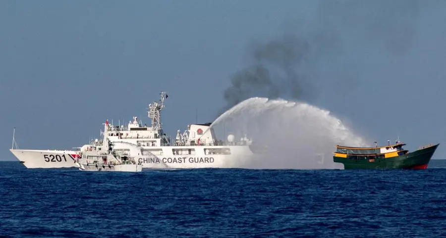 China fires water cannons at Philippine vessels near Scarborough