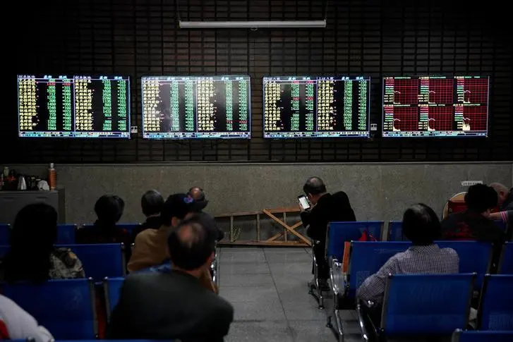 Investors look at screens showing stock information at a brokerage house in Shanghai, China May 6, 2019. REUTERS/Aly Song , Reuters Images/REUTERS