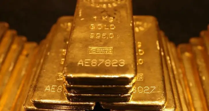 Gold hovers near 3-week low as traders await Powell's remarks