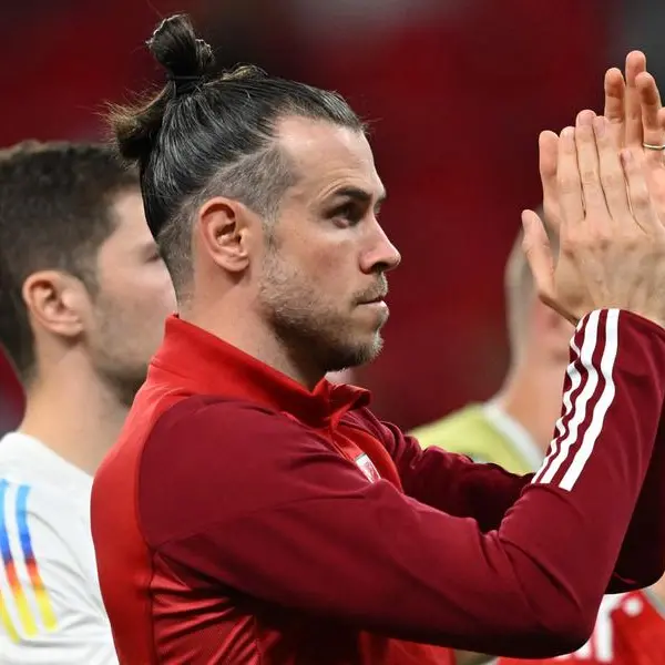 Bale will continue as long as he is wanted by Wales