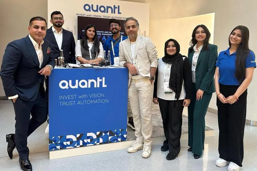 Quantl AI Managing Partner Madhur Kakkar and team at CMT Summit. Image Courtesy: Quantl AI