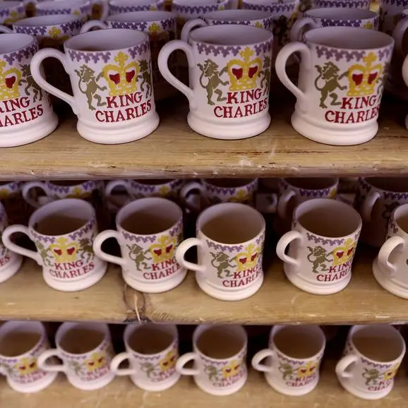 Charles' mugs and plates: Workers busy making pottery fit for a new king