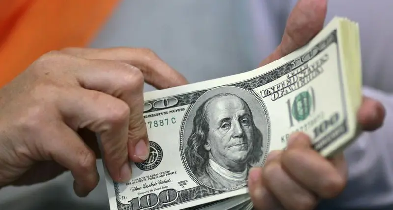Dollar edges up as traders await rate cut clues, euro stabilises