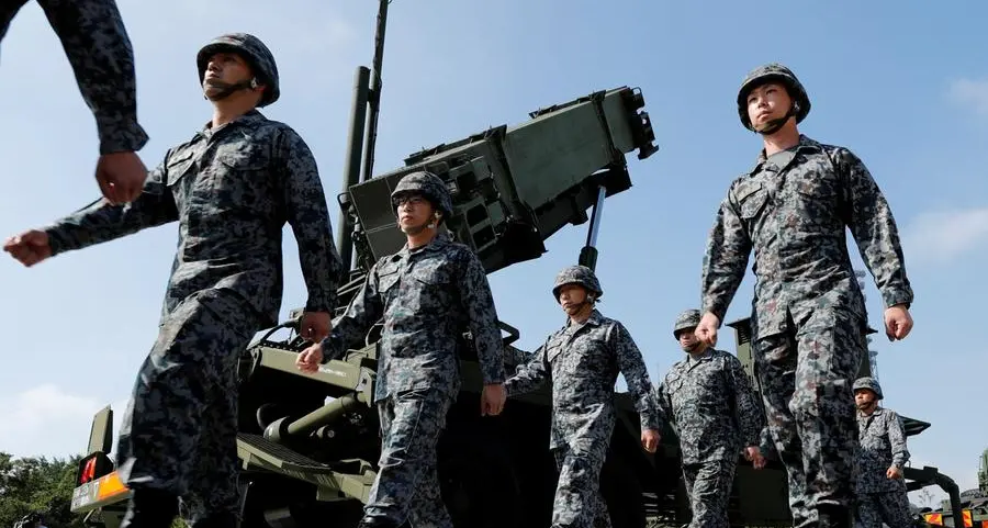 Japan puts missile defence on alert as N.Korea warns of satellite launch
