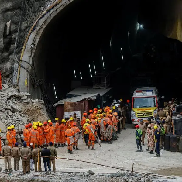 Indian rescuers break through tunnel debris to evacuate trapped workers