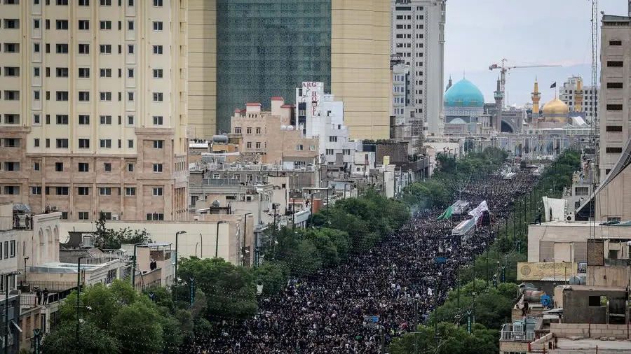 Mourners pack Iranian city for burial of President Raisi
