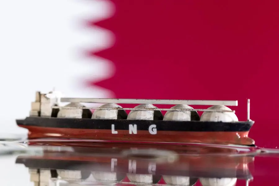 Model of LNG tanker is seen in front of Qatar\\'s flag in this illustration taken May 19, 2022. REUTERS/Dado Ruvic/Illustration Image for illustrative purpose.