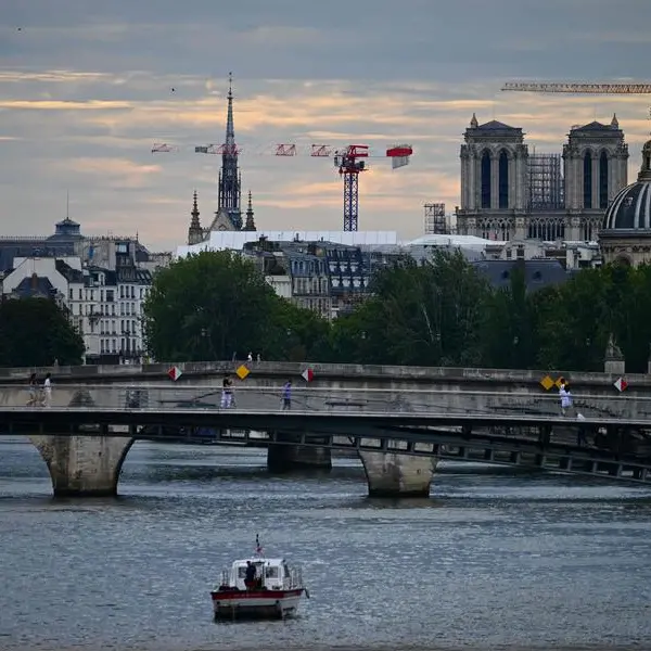 Seine pollution scraps swimming stage of pre-Olympics triathlon