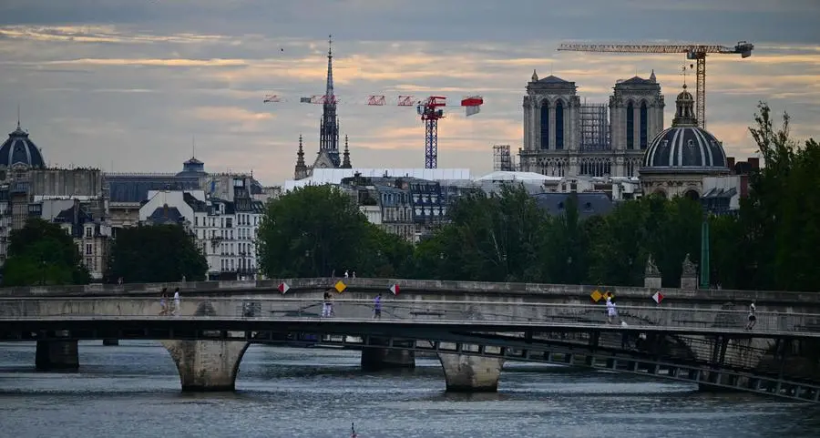 Seine pollution scraps swimming stage of pre-Olympics triathlon