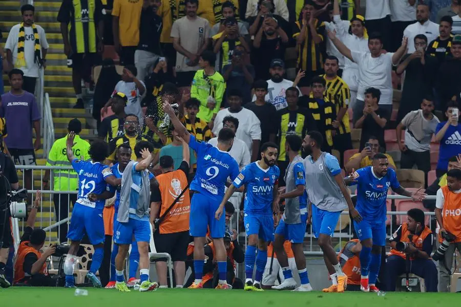 JEDDAH, SAUDI ARABIA - APRIL 30: Saud Abdulhamid (2nd L) of Al Hilal celebrates with teammates after scoring the second goal during the Kings Cup Saudi Arabia Semi Final match between Al-Ittihad and Al Hilal at King Abduallah Sport City Stadium on April 30, 2024 in Jeddah, Saudi Arabia. (Photo by Yasser Bakhsh/Getty Images) , Getty Images