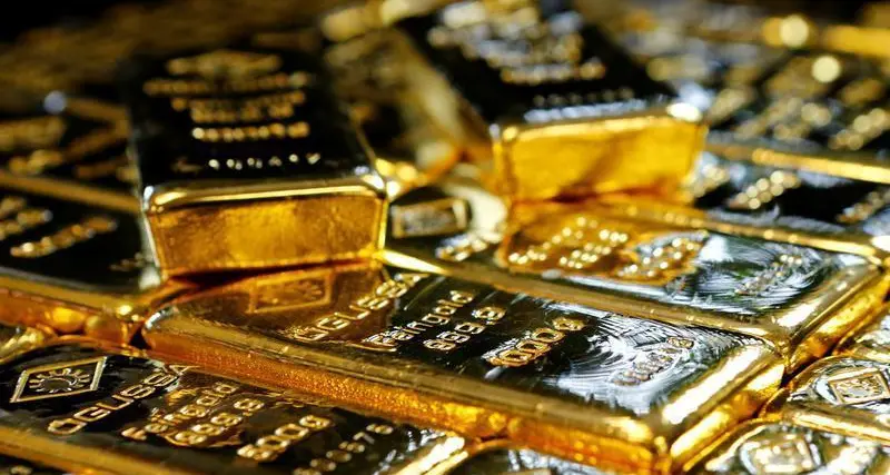 Gold faces third weekly drop on dollar strength, US debt deal hopes