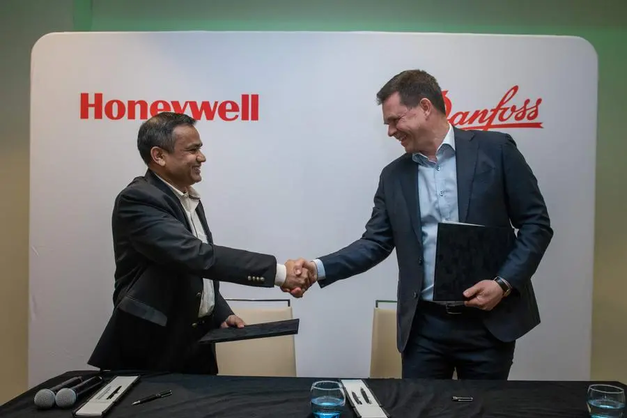 <p>L-R Pramesh Maheshwari, President of Honeywell Process Solutions and Mika Kulju, President, Danfoss Power Electronics and Drives Segment</p>\\n