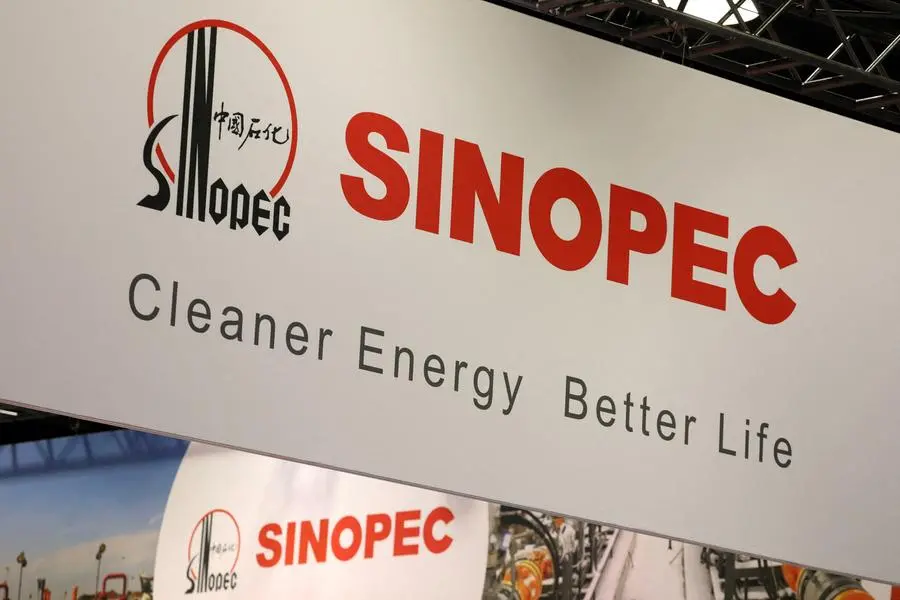 FILE PHOTO: The logo of China Petroleum & Chemical Corporation, or Sinopec, is displayed during the LNG 2023 energy trade show in Vancouver, British Columbia, Canada, July 12, 2023. REUTERS/Chris Helgren/File Photo , Reuters/REUTERS