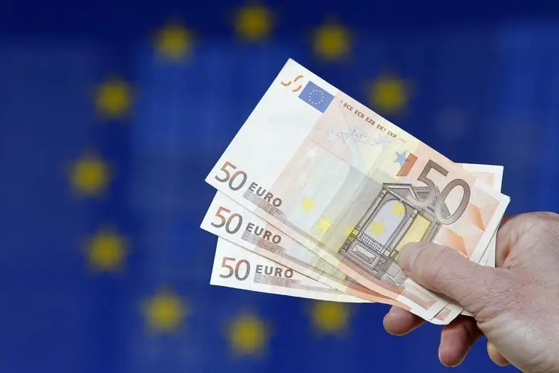A picture illustration shows euro banknotes outside the European Commission headquarters in Brussels November 28, 2011. Image for illustrative purpose. , Reuters Images