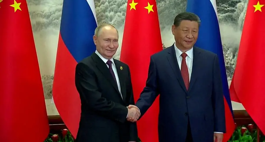 Putin arrives in China to deepen strategic ties with Xi