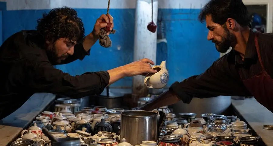 Afghan cook pours his heart into 'teapot' lamb stew