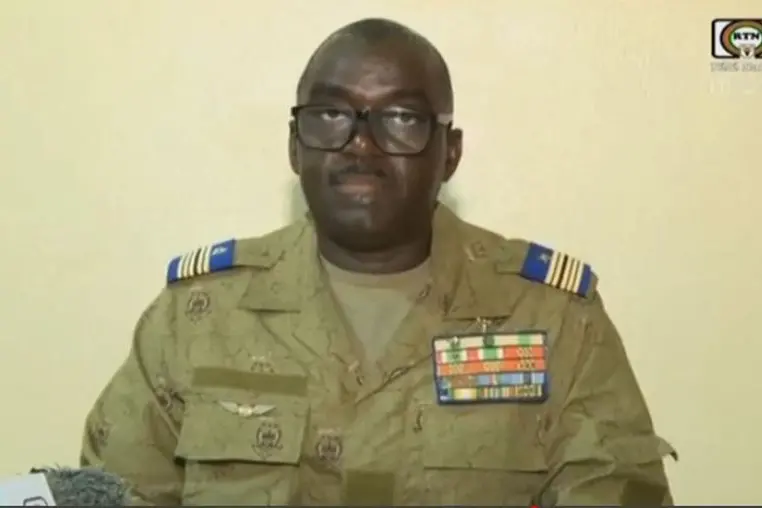 This video frame grab image obtained by AFP from ORTN - T\\uFFFDl\\uFFFD Sahel on July 31, 2023 shows Colonel Major Amadou Abdramane reading a statement on national television. In a statement read on national TV, Niger\\'s new junta accuses France of seeking to \"intervene militarily\" to reinstate deposed President Mohamed Bazoum, as tension mounts with the country\\'s former colonial power. They said \"all institutions\" in the country would be suspended, borders were closed, and a curfew had been imposed \"until further notice\". (Photo by ORTN - T\\uFFFDl\\uFFFD Sahel / AFP) , Agence France-Presse (AFP)/AFP