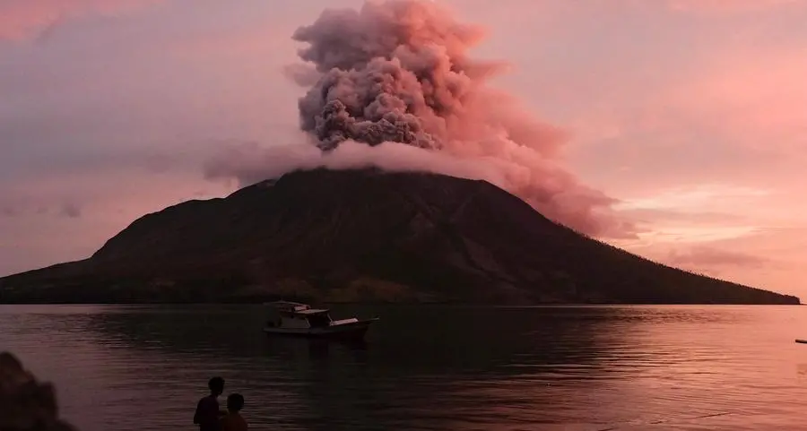 Volcano erupts in eastern Indonesia, spews miles-high ash tower
