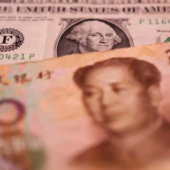 China's yuan holds steady as PBOC sets aggressive fixing