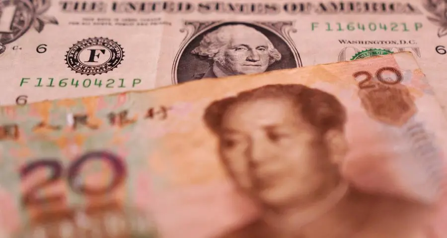 China's yuan holds steady as PBOC sets aggressive fixing