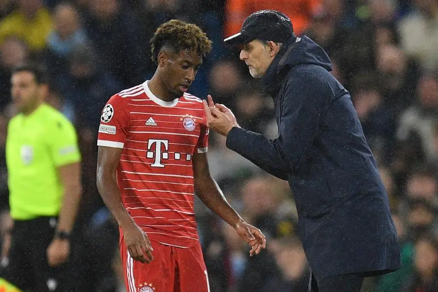 Bayern Munich\\'s German head coach Thomas Tuchel (R) speaks with Bayern Munich\\'s French striker Kingsley Coman (L) during the UEFA Champions League quarter final, first leg football match between Manchester City and Bayern Munich at the Etihad Stadium in Manchester, north-west England, on April 11, 2023. (Photo by Oli SCARFF / AFP) , Agence France-Presse (AFP)/AFP