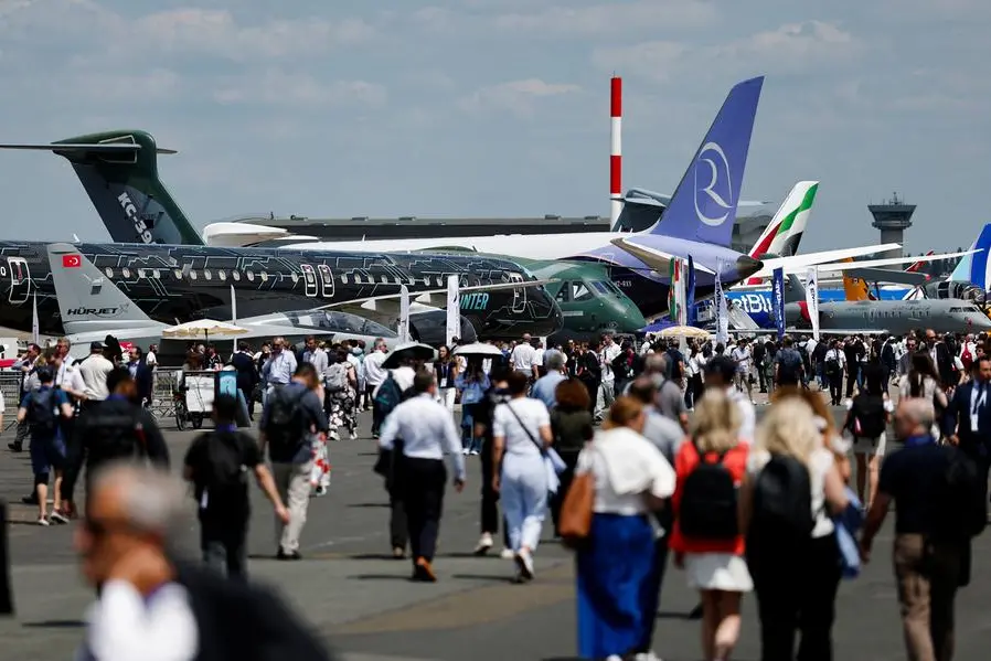 Attendees gather near static aircraft displays at the 55th International Paris Airshow at Le Bourget Airport near Paris, France, June 17, 2025. REUTERS/Benoit Tessier. , Reuters