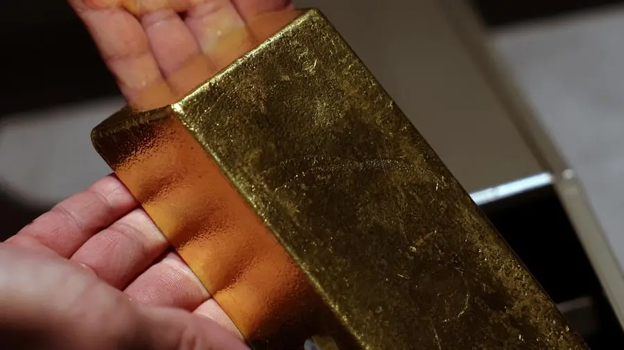 Gold rises, set for weekly gain as US fiscal woes boost appeal