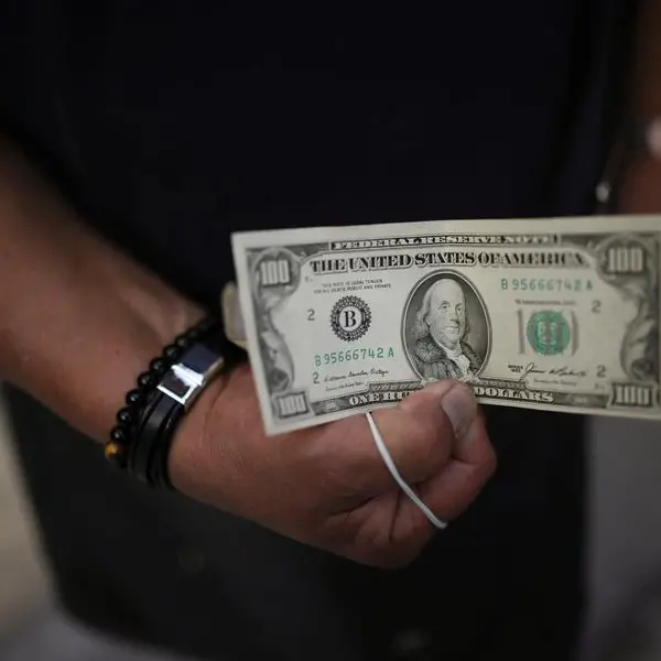 Dollar on back foot ahead of payrolls data even as trade talks go on