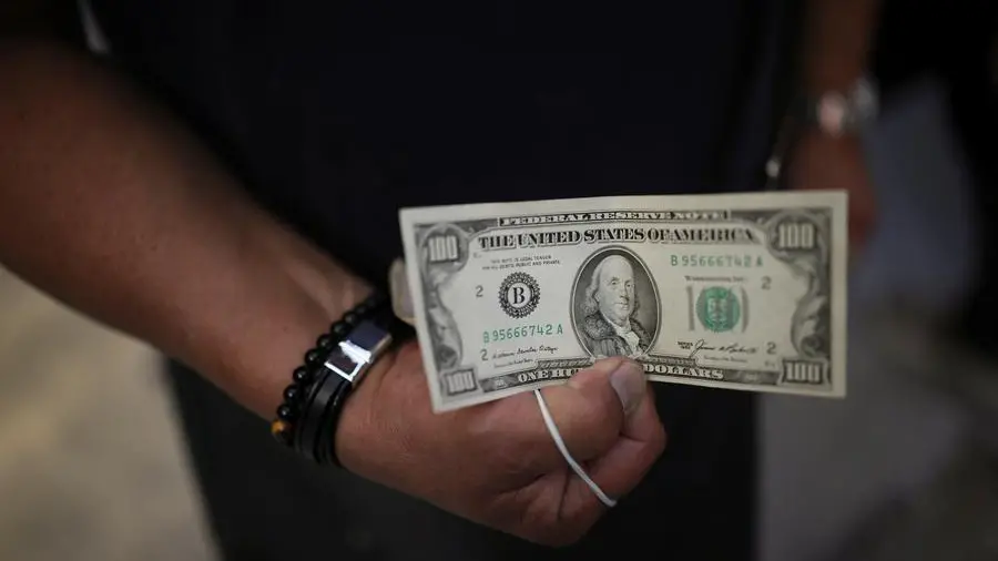 Dollar on back foot ahead of payrolls data even as trade talks go on
