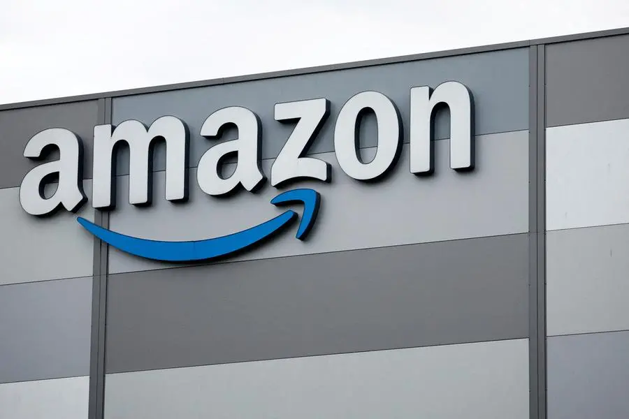 FILE PHOTO: The logo of Amazon is pictured at the company logistics center in Carquefou near Nantes, France, October 15, 2024. REUTERS/Stephane Mahe. , Reuters