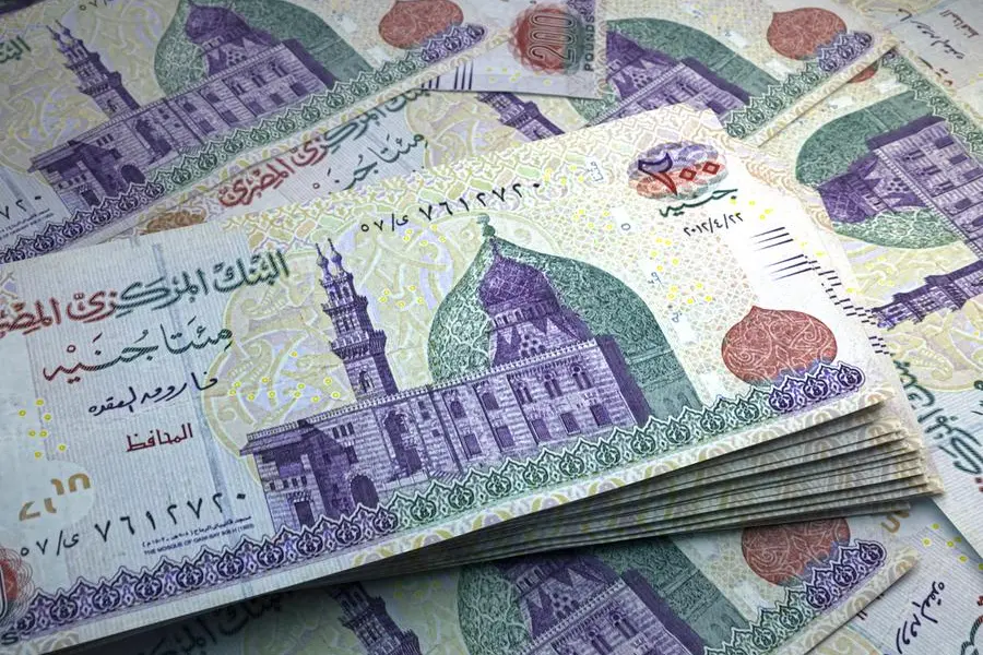 Money of Egypt. Egyptian pound bills. EGP banknotes. 200 pounds. Business, finance, news background. Image Courtesy: Getty Images , Getty Images