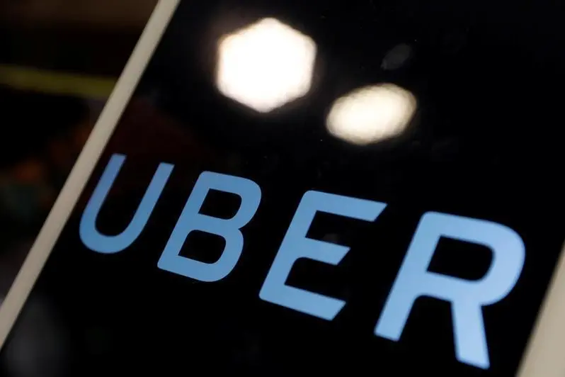 Image used for illustrative purpose The logo of Uber is seen on an iPad, during a news conference to announce Uber resumes ride-hailing service, in Taipei, Taiwan April 13, 2017. Reuters Images/Tyrone Siu
