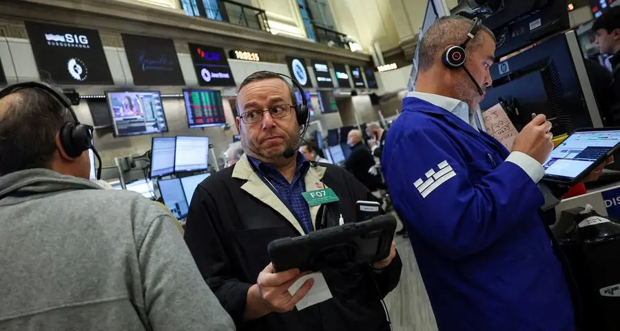 Wall Street futures and dollar slide on Trump tariff tumult