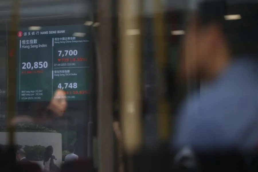 China, HK stocks dip with earnings, US tech restrictions in focus