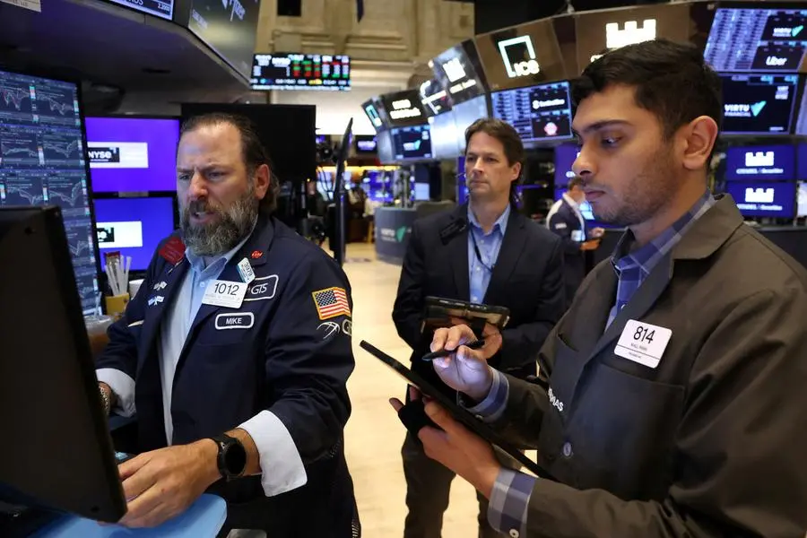 Traders work on the floor at the New York Stock Exchange (NYSE) in New York City, U.S., June 17, 2025. REUTERS/Brendan McDermid. , Reuters