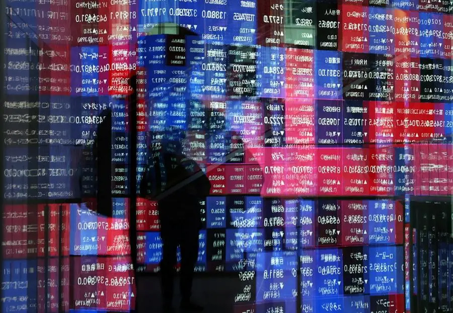 Asia shares slip as markets reprice Fed expectations, oil gains