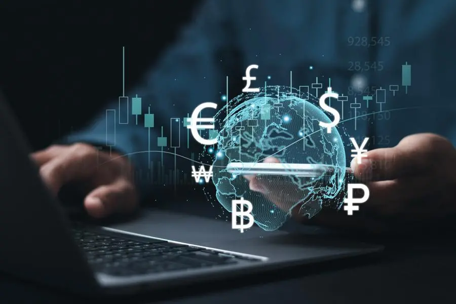 Online banking interbank payment concept. Businessman use smartphone with virtual global currency symbols for money transfers and currency exchanges between countries of the world. Image used for illustrative purpose. Getty Images , Getty Images