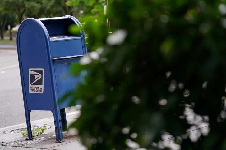 A U.S. Postal Service blue collection box is seen on Capitol Hill in Washington, U.S., August 13, 2020. The U.S. Postal Service is a sticking point on the stalled congressional talks with the Trump administration on the latest coronavirus relief. REUTERS/Sarah Silbiger , Reuters Images/REUTERS
