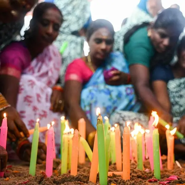 Tears, prayers as Asia mourns tsunami dead 20 years on