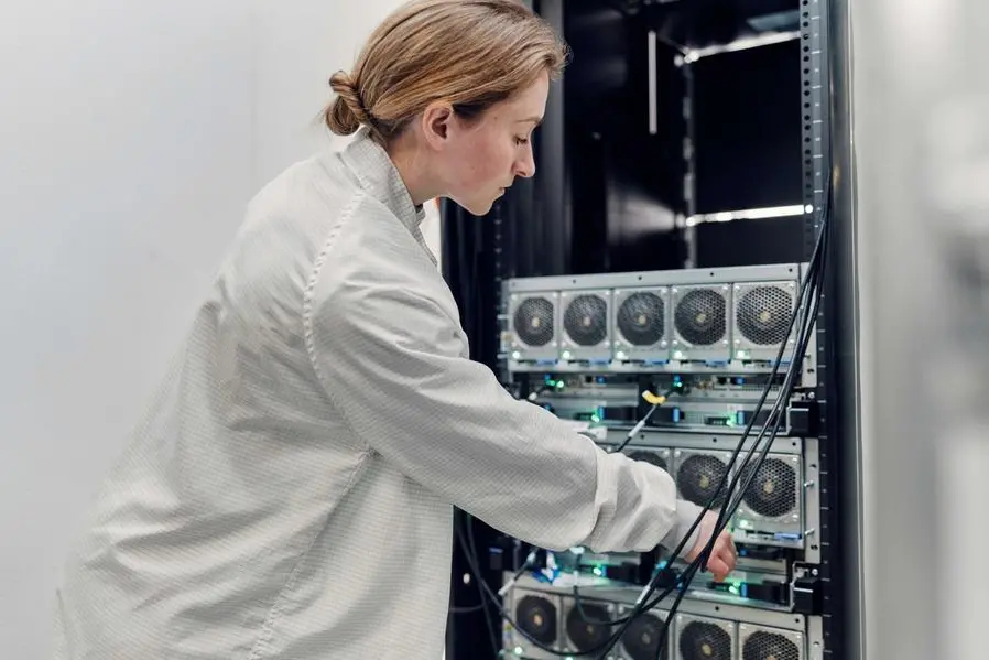 IBM engineer in Poughkeepsie, NY testing components on IBM\\u2019s new z17 mainframe. Image Courtesy: IBM