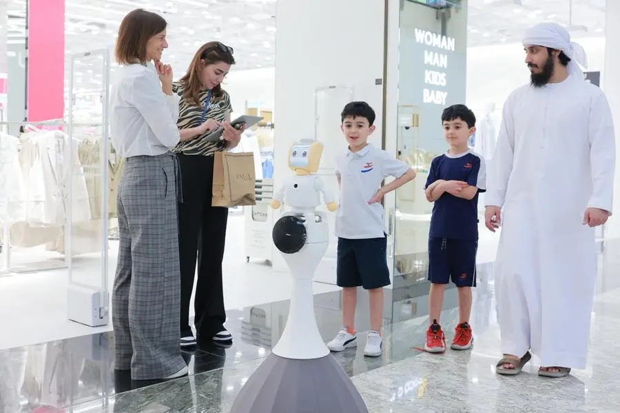 The partnership showcases a live pilot at City Centre Mirdif, featuring two avatar-style robots. Image Courtesy: DFF