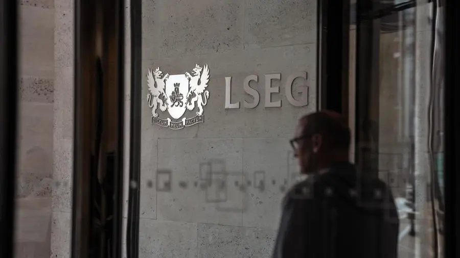 Stocks bide time before jobs report, tariff ruling