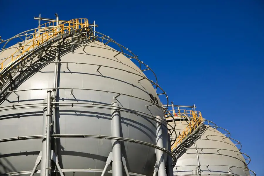 Storage sphere tanks for liquefied natural gas (LNG) stand at a port in Jordan. Photographer: Annie Sakkab/Bloomberg. Image used for illustrative purpose. Image courtesy: Getty Images/ Bloomberg Creative Photos